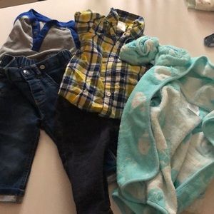 Two baby top and bottom set and a bath rub